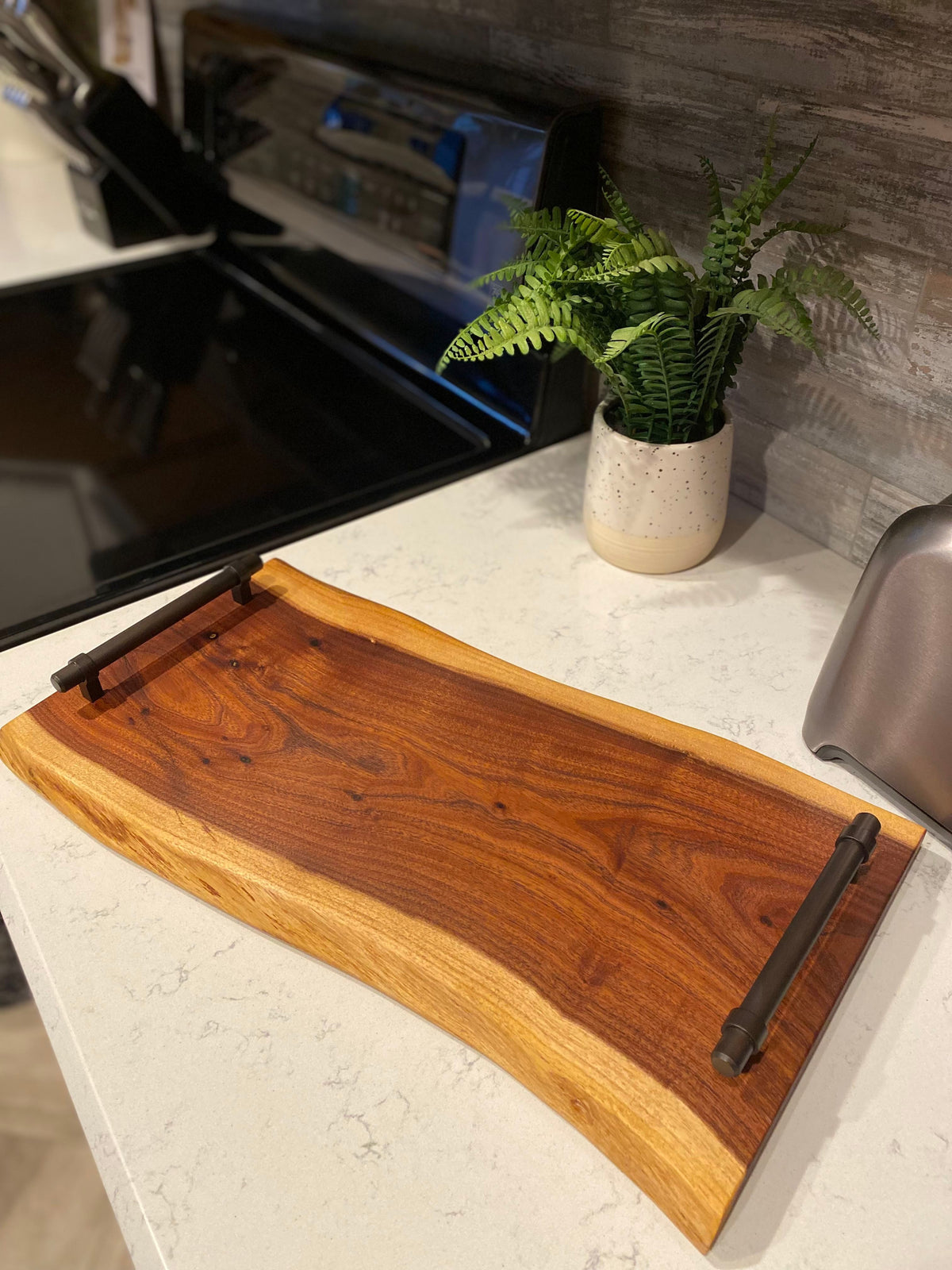 Large live edge wood charcuterie board with enhanced round handles
